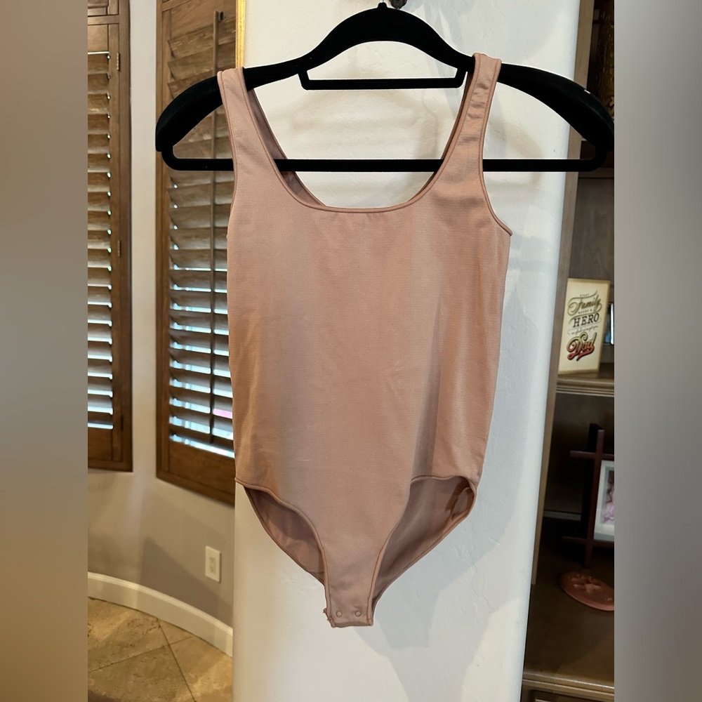 Never worn body suit